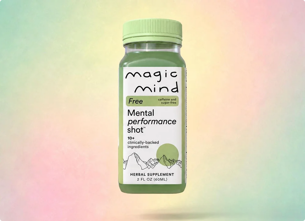 Magic Mind Free Mental Performance Shot bottle on a pastel gradient background.